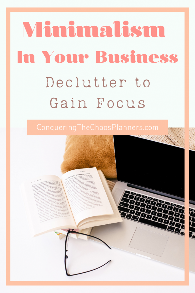 A computer, book, and glasses set on a white background with the title Minimalism in Business: Declutter to Gain Focus Title 