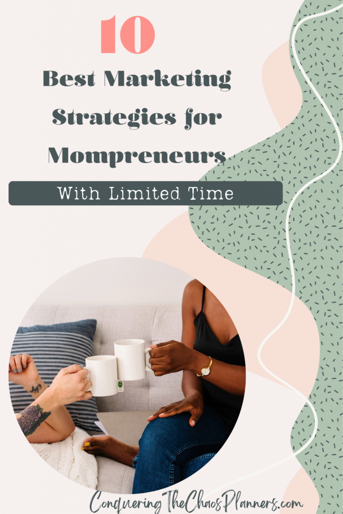 Two women sitting on a couch, holding white mugs and toasting. Abstract background with text overlay that says: '10 Best Marketing Strategies for Mompreneurs with Limited Time'. Website URL at the bottom: ConqueringTheChaosPlanners.com.